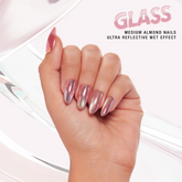 Close-up of a model's hand wearing 383 Glass Light Pink Press On Nail